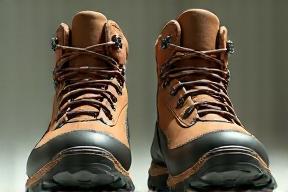 Before and after photo of hiking boots showing custom fitting and improved comfort