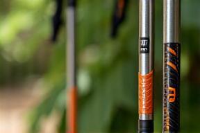 Before and after image of trekking poles repaired and polished, ready for use